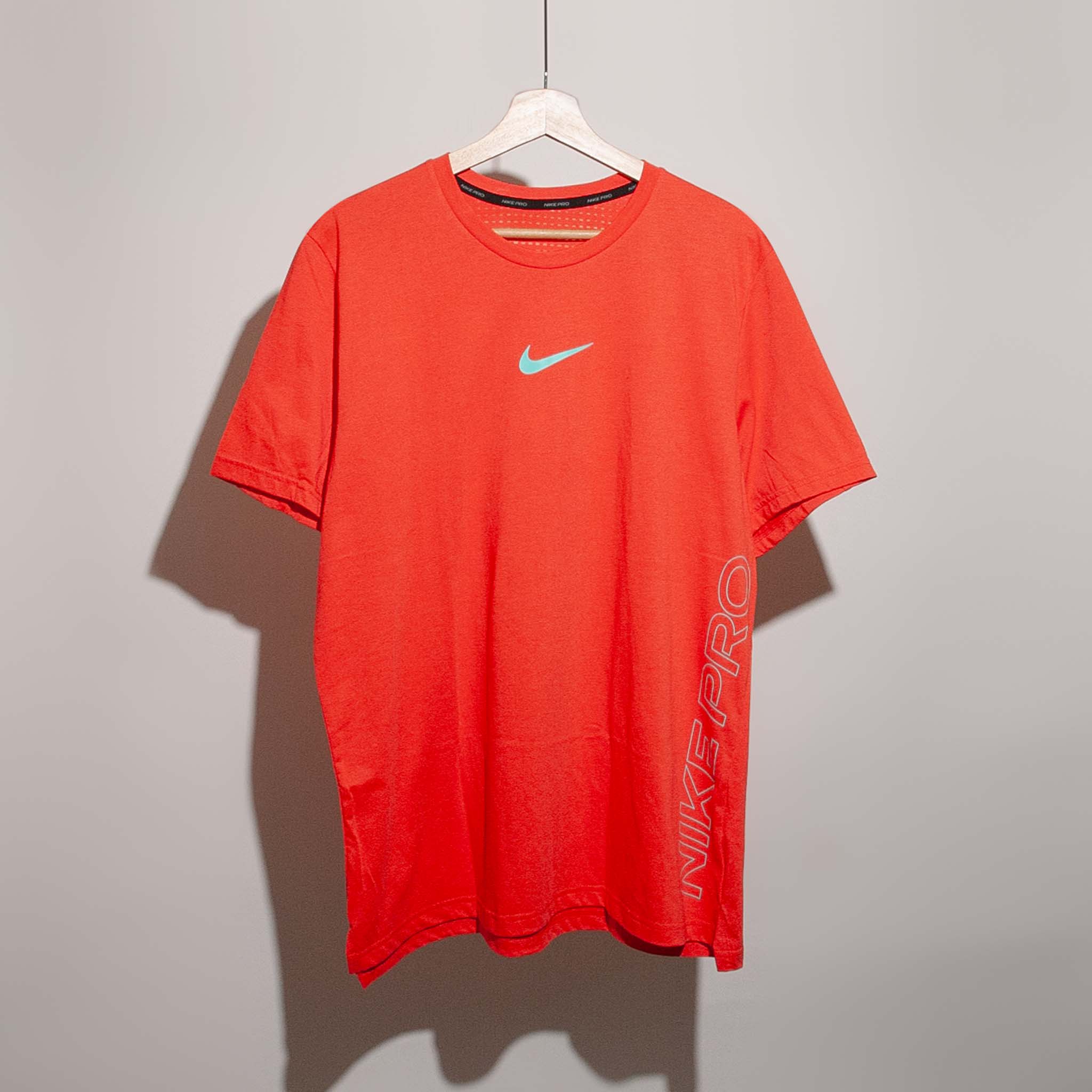 orange nike compression shirt