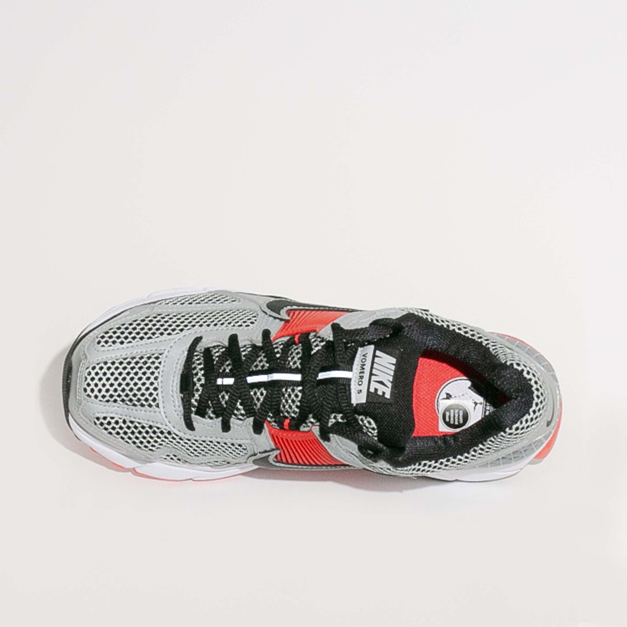 Top-down view of the Nike Zoom Vomero 5 highlighting the lace system, tongue branding, and ventilated mesh upper.