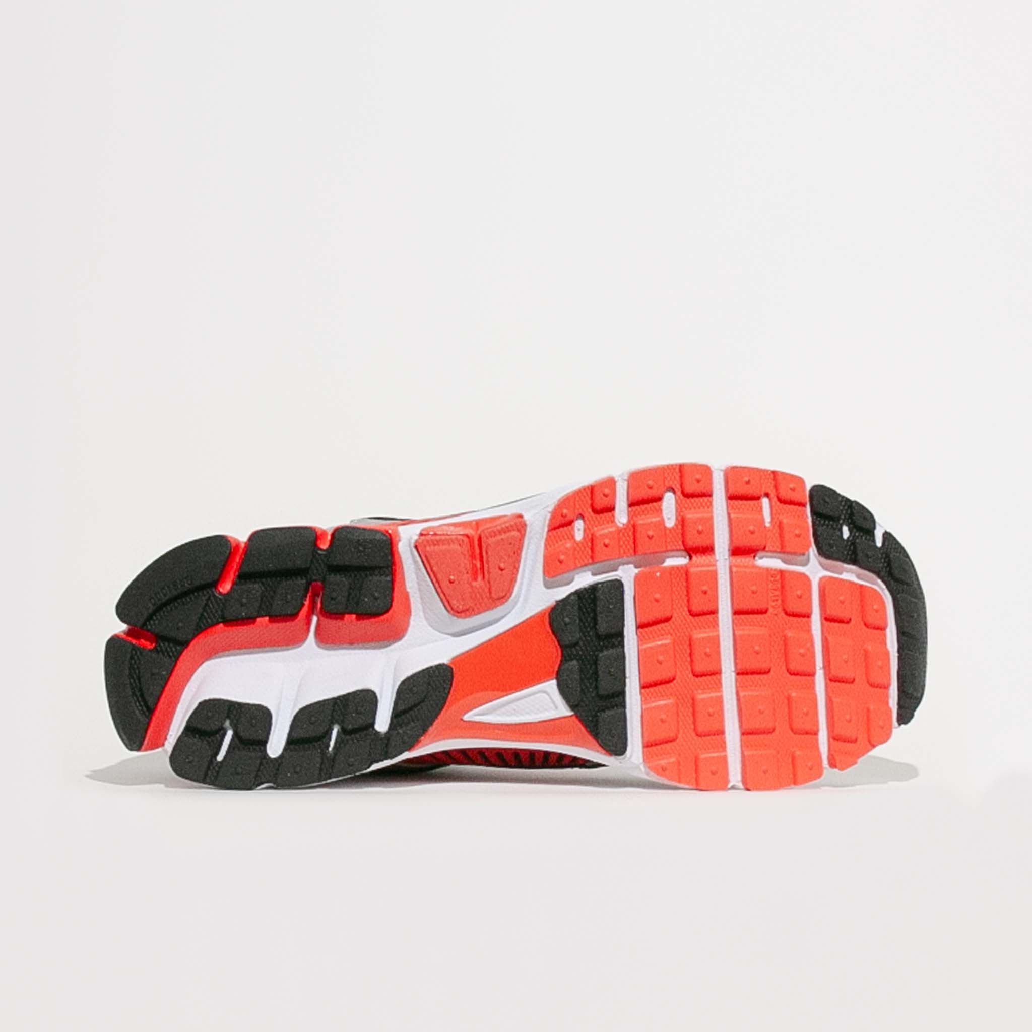 Outsole view of the Nike Zoom Vomero 5 featuring rubber traction pattern and forefoot flex grooves.