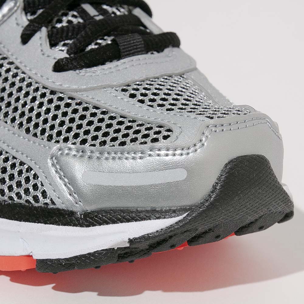 Close-up of the toe area on the Nike Zoom Vomero 5 highlighting synthetic overlays and mesh construction.