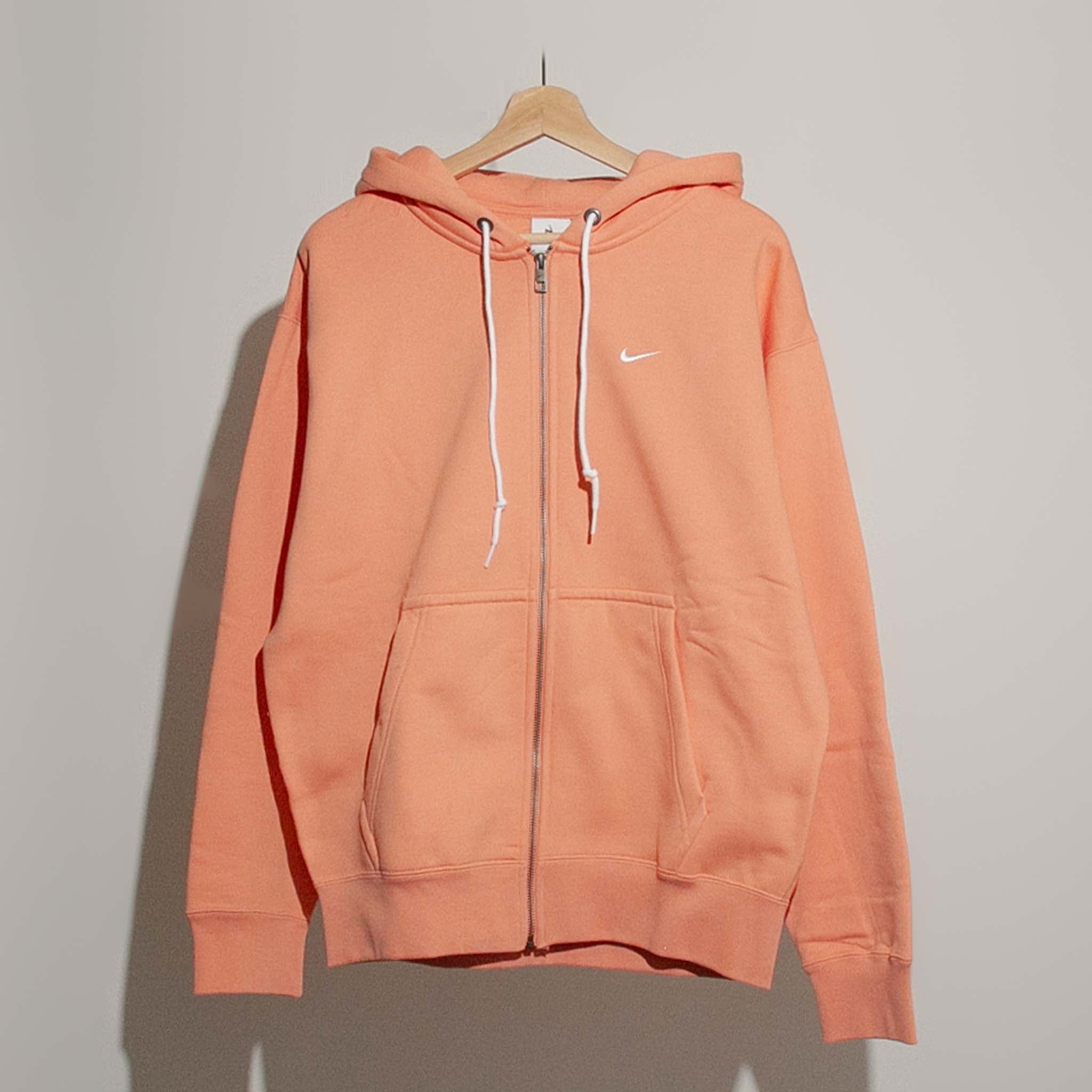 peach nike half zip